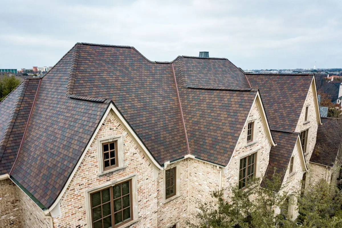 Lifetime engineered designer shingle roof in Stone Oak Stone Oak home with a lifetime engineered designer shingle roofing system by Atrium Roofing