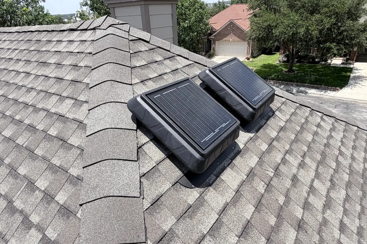 Solar attic ventilation in New Braunfels Solar-powered attic vents on a lifetime engineered asphalt shingle roof in New Braunfels